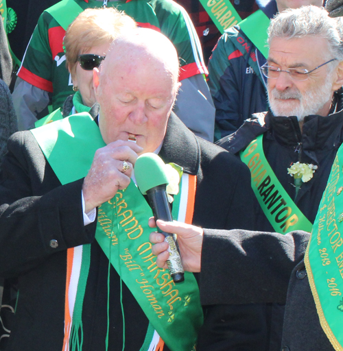 Grand Marshall  Bill Homan blew the whistle to begin the Parade